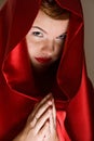 Attractive young woman in red hood Royalty Free Stock Photo