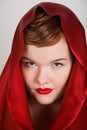 Attractive young woman in red hood Royalty Free Stock Photo