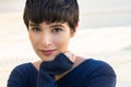 Attractive young woman with short stylish hair friendly smile Royalty Free Stock Photo