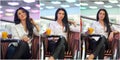 Attractive young woman sitting on armchair in shopping center. Beautiful fashionable young lady wearing white male shirt in mall.