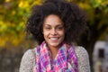 Attractive young woman smiling in autumn outdoors Royalty Free Stock Photo