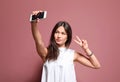 Attractive young woman taking selfie Royalty Free Stock Photo