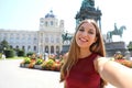 Attractive young woman taking selfie in Maria Theresa square in Vienna, Austria Royalty Free Stock Photo