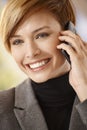 Attractive young woman talking on mobile phone Royalty Free Stock Photo