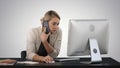 Attractive young woman talking on the mobile phone and smiling w Royalty Free Stock Photo