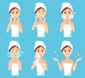 Attractive young woman with a towel around her head and body remove make-up, clean, wash and care her face with sponge. Royalty Free Stock Photo