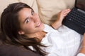 Attractive young woman using a laptop Royalty Free Stock Photo