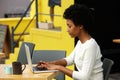 Attractive young woman using laptop outside Royalty Free Stock Photo