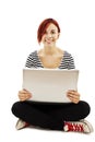 Attractive young woman using notebook computer Royalty Free Stock Photo