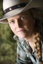 Attractive Young Woman Wearing a Cowboy Hat Royalty Free Stock Photo