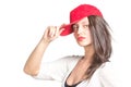 Attractive young woman wearing a red baseball cap Royalty Free Stock Photo