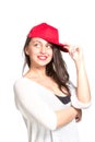 Attractive young woman wearing a red baseball cap Royalty Free Stock Photo