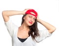 Attractive young woman wearing a red baseball cap Royalty Free Stock Photo