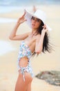 Attractive Young Woman Wearing a Swimsuit and a Ha Royalty Free Stock Photo