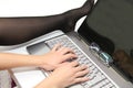 Attractive young woman working on her laptop at home Royalty Free Stock Photo