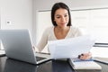 Attractive young woman working with laptop computer Royalty Free Stock Photo