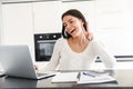 Attractive young woman working with laptop computer Royalty Free Stock Photo