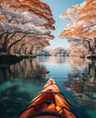 an attractively decorated kayak is floating past snow covered trees in a lake