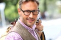 Attractve man with eyeglasses walking in street