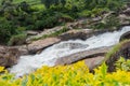 Atukkad Waterfalls near Munnar in Kerala, South India on cloudy day in rain season Royalty Free Stock Photo