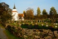 Atumn on norwegian cemetery and church, Norway Royalty Free Stock Photo