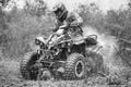 ATV enduro race with rider in the mud