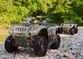 ATV parked on the shore of a mountain river Royalty Free Stock Photo