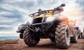 ATV quad bike on forest offroad, front view. Concept motocross quadricycle summer travel background Royalty Free Stock Photo