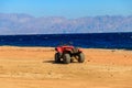 ATV quad bike for safari trips on shore of the Red Sea in the Gulf of Aqaba. Dahab, Egypt Royalty Free Stock Photo