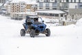 ATV quad bike young driver on the snow