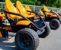 ATV quad bikes stand parked in a park Royalty Free Stock Photo