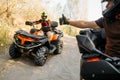 ATV rider showing thumbs up to his partner Royalty Free Stock Photo
