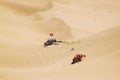 ATV riders in the vast desert Royalty Free Stock Photo