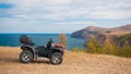 ATV on a rocky seashore Royalty Free Stock Photo