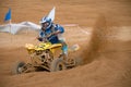 ATV scatters sand and dirt Royalty Free Stock Photo