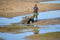ATV Stuck Mud Pit Pond Man Royalty Free Stock Photo