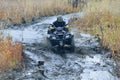 ATV and UTV driving in mud and water