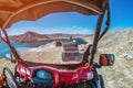 ATVs on the lake in the mountains in summer