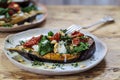 Aubergine with goat cheese and crispy kale Royalty Free Stock Photo