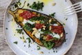 Aubergine with goat cheese and crispy kale