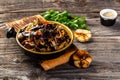 Aubergine with vegetables. Hot spicy stewed eggplant in Korean, with tomatoes, paprika, carrot, onion and garlic. Vegan food Royalty Free Stock Photo