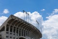 AUBURN ALABAMA, USA - JUNE 18, 2020 - Concrete stadium seating viewed from the outside, blue sky with white clouds