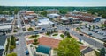 Auburn downtown aerial over James Cultural Plaza with distant courthouse