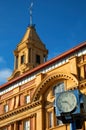 The Auckland Ferry Terminal in close up with a blue clock Royalty Free Stock Photo