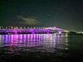 Auckland Harbour bridge in New Zealand lit with decorative lights at night