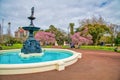 AUCKLAND, NEW ZEALAND - AUGUST 26, 2018: Albert Park fountain and city background Royalty Free Stock Photo