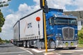 Blue Kenworth K200 heavy freight truck