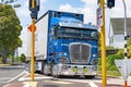 Blue Kenworth K200 heavy freight truck