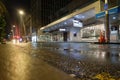 Rainy night and wet city street in darkness of morning Royalty Free Stock Photo