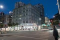 Night scene corner Queen and Victoria Streets passing traffic a